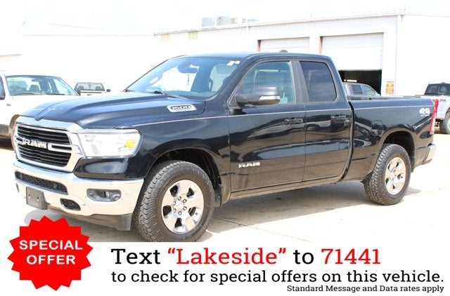 2021 RAM 1500 Big Horn in Diamond Black Crystal Pearlcoat — front three-quarter view
