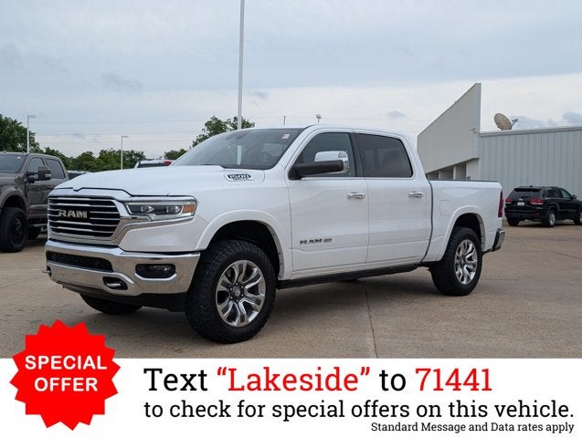 2019 RAM 1500 Longhorn in Ivory White Tri-Coat Pearlcoat — front three-quarter view