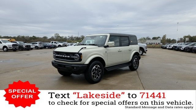 2025 Ford Bronco Outer Banks in Desert Sand — front three-quarter view